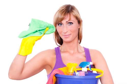 Detailed Airbnb turnover cleaning in progress with organized supplies
