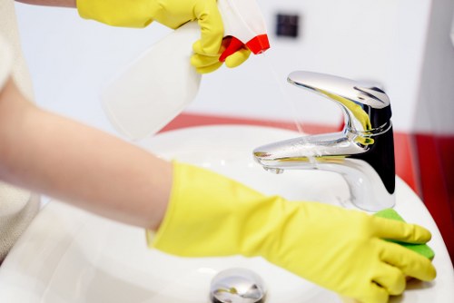 Kitchen surfaces being deep cleaned for grease and grime removal